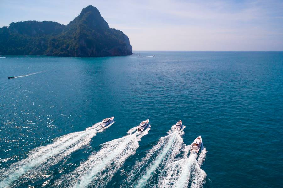 Axopar boats running at speed between islands
